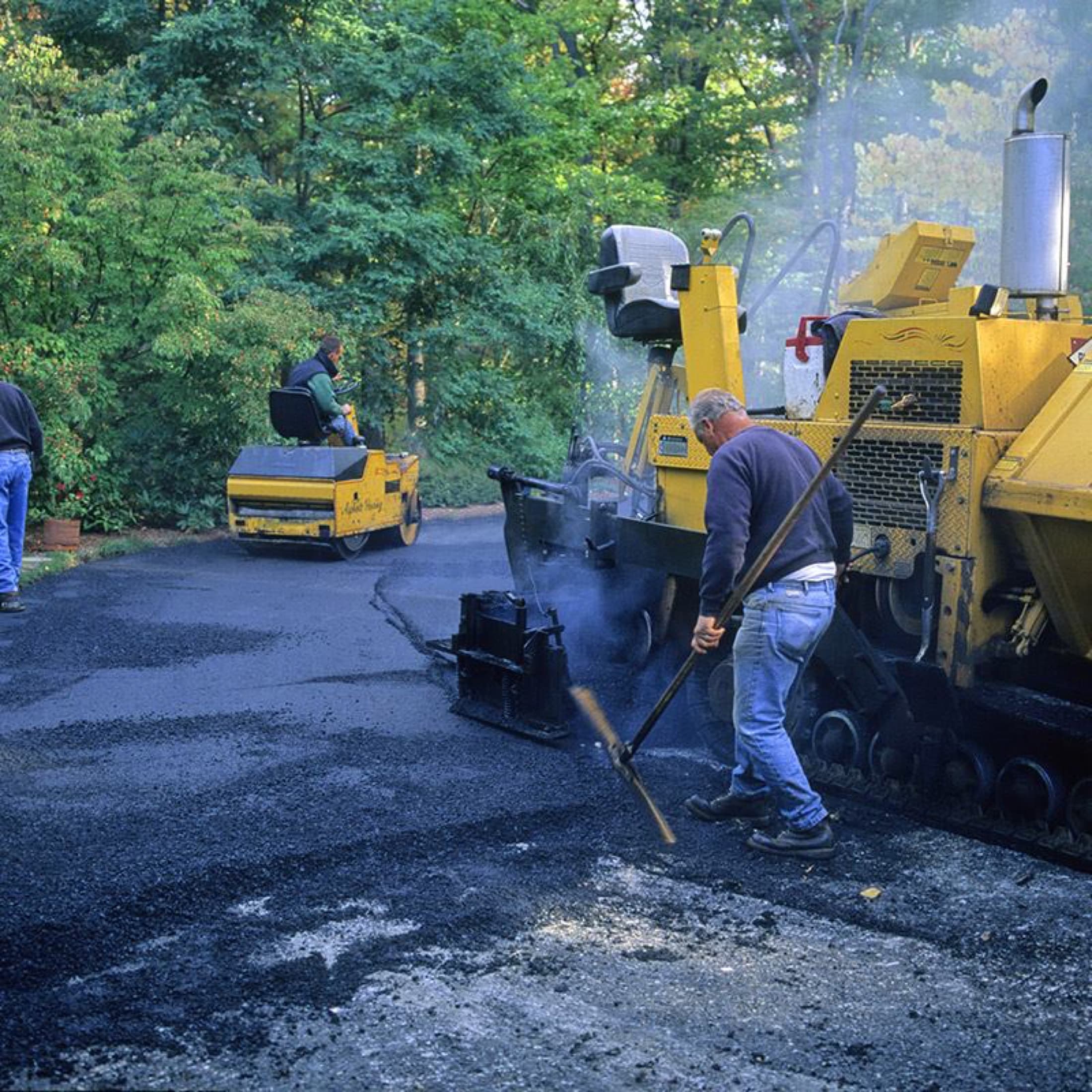 Asphalt paving driveway crew