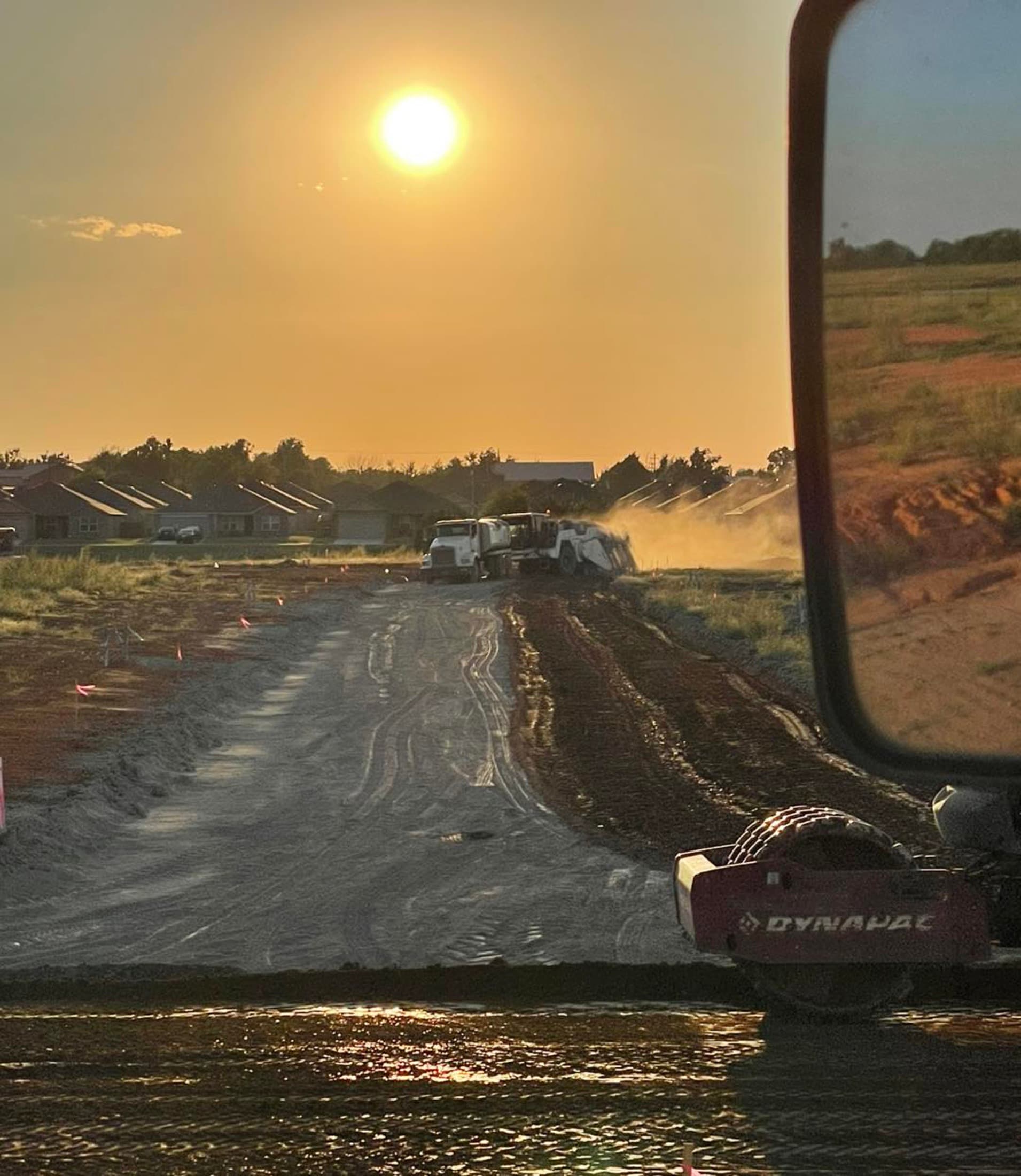 Earthwork underway at sunset on an Oklahoma site
