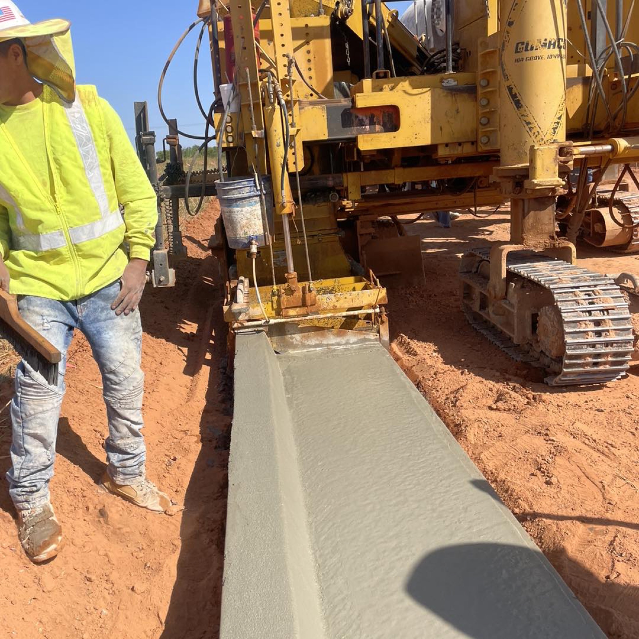 Fresh curb coming off the slipform paver