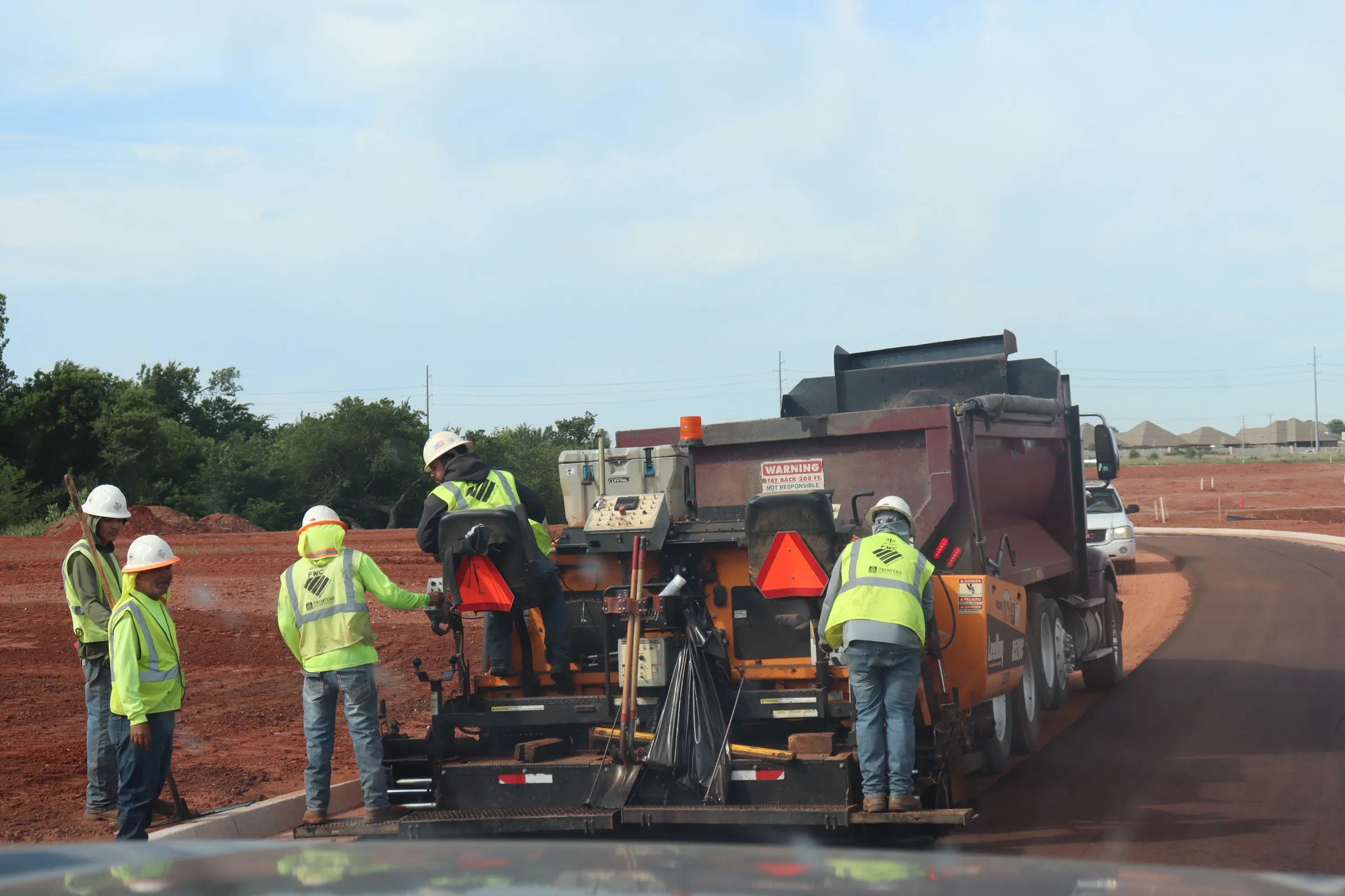 First Water crew working behind the paver